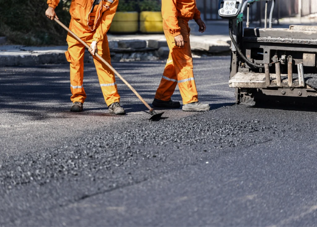 image-of-workers-spreading-asphalt image-of-workers-spreading-asphalt